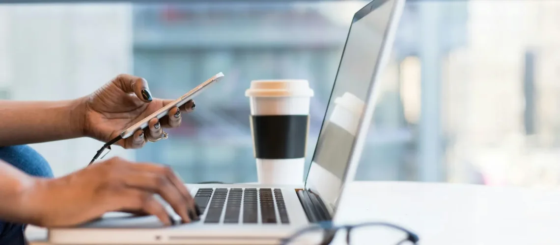 Free laptop on table top stock photo